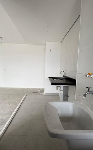 Apartamento à venda com 64m², 2 quartos e 2 vagasCozinha e Área de Serviço