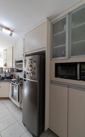 Apartamento à venda com 52m², 2 quartos e 1 vaga Apartamento à venda com 52m², 2 quartos e 1 vagaCozinha e Área de Serviço
