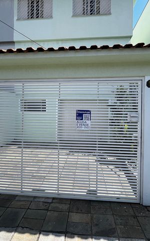 Casa à venda com 200m², 4 quartos e 4 vagasFachada - Placa