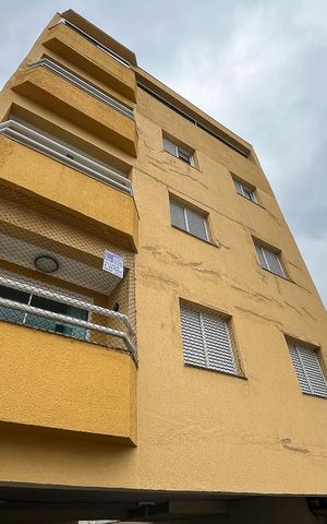 Apartamento à venda com 69m², 2 quartos e 1 vagaFachada e plaquinha