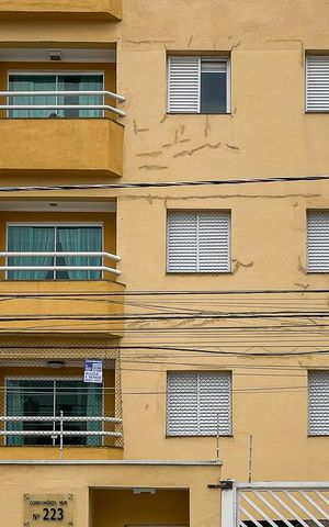 Apartamento à venda com 69m², 2 quartos e 1 vagaFachada e plaquinha