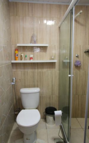 Casa de condomínio à venda com 146m², 2 quartos e 1 vagaBanheiro 1