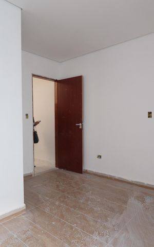 Casa de condomínio à venda com 117m², 2 quartos e 1 vagaSuíte 1