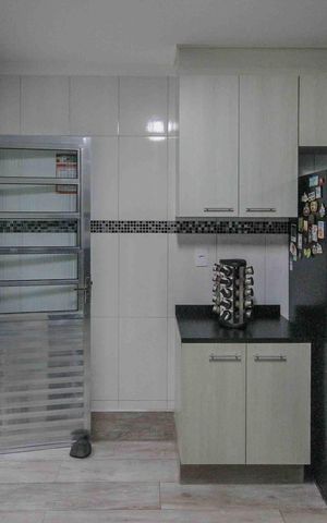 Casa à venda com 140m², 3 quartos e 2 vagas Casa à venda com 140m², 3 quartos e 2 vagasCozinha