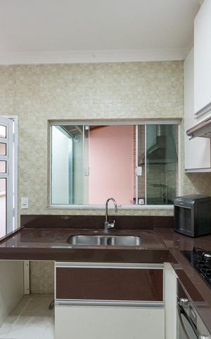 Casa à venda com 95m², 3 quartos e 2 vagas Casa à venda com 95m², 3 quartos e 2 vagasCozinha