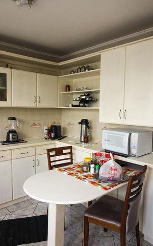 Casa à venda com 292m², 4 quartos e 4 vagas Casa à venda com 292m², 4 quartos e 4 vagasCozinha