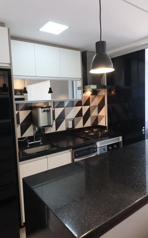 Apartamento à venda com 60m², 2 quartos e 2 vagasCozinha e Área de Serviço