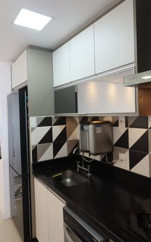Apartamento à venda com 60m², 2 quartos e 2 vagasCozinha e Área de Serviço