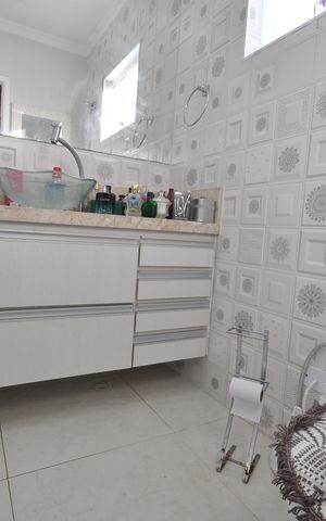 Casa à venda com 135m², 3 quartos e 3 vagasBanheiro da Suíte
