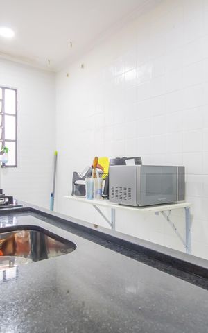 Apartamento à venda com 45m², 2 quartos e 1 vaga Apartamento à venda com 45m², 2 quartos e 1 vagaCozinha e Área de Serviço