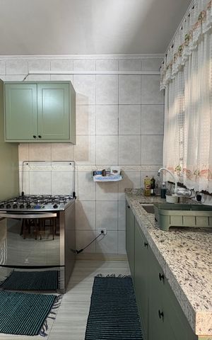 Casa à venda com 147m², 3 quartos e 3 vagas Casa à venda com 147m², 3 quartos e 3 vagasCozinha
