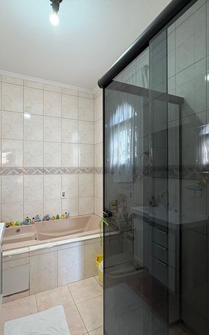 Casa à venda com 147m², 3 quartos e 3 vagas Casa à venda com 147m², 3 quartos e 3 vagasBanheiro da Suíte