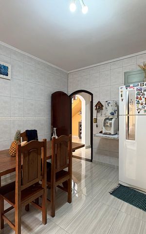 Casa à venda com 147m², 3 quartos e 3 vagas Casa à venda com 147m², 3 quartos e 3 vagasCozinha