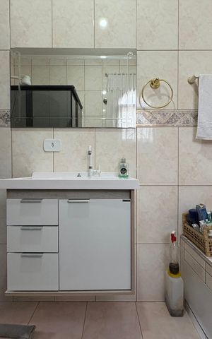 Casa à venda com 147m², 3 quartos e 3 vagas Casa à venda com 147m², 3 quartos e 3 vagasBanheiro da Suíte
