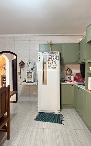 Casa à venda com 147m², 3 quartos e 3 vagas Casa à venda com 147m², 3 quartos e 3 vagasCozinha