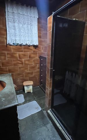 Casa à venda com 600m², 4 quartos e 2 vagasBanheiro social