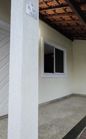 Casa de condomínio à venda com 103m², 3 quartos e 3 vagas Casa de condomínio à venda com 103m², 3 quartos e 3 vagasFachada