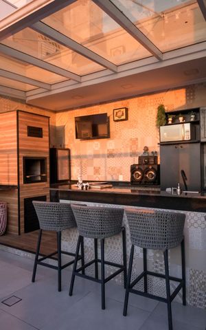 Apartamento à venda com 145m², 3 quartos e 2 vagas Apartamento à venda com 145m², 3 quartos e 2 vagasÁrea gourmet do apartamento