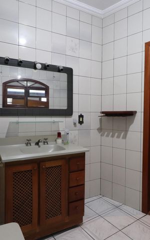 Casa à venda com 400m², 6 quartos e 3 vagasBanheiro da Suíte 1