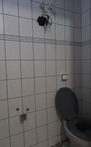 Casa à venda com 400m², 6 quartos e 3 vagasBanheiro da Suíte 3
