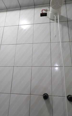 Casa à venda com 400m², 6 quartos e 3 vagasBanheiro da Suíte 2