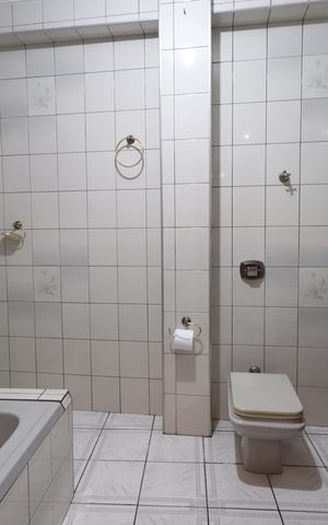 Casa à venda com 400m², 6 quartos e 3 vagasBanheiro da Suíte 1