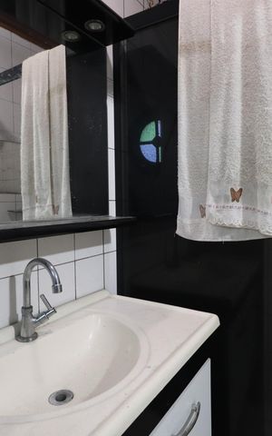 Casa à venda com 400m², 6 quartos e 3 vagasBanheiro da Suíte 4