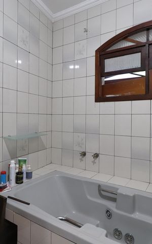 Casa à venda com 400m², 6 quartos e 3 vagasBanheiro da Suíte 1