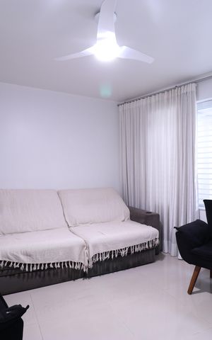 Casa à venda com 105m², 2 quartos e 2 vagasSala