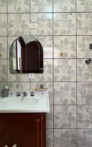 Casa à venda com 360m², 5 quartos e 5 vagas Casa à venda com 360m², 5 quartos e 5 vagasBanheiro da Suíte 2