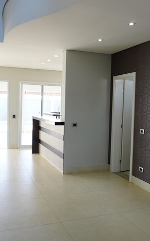 Casa de condomínio para alugar com 330m², 4 quartos e 4 vagasSala