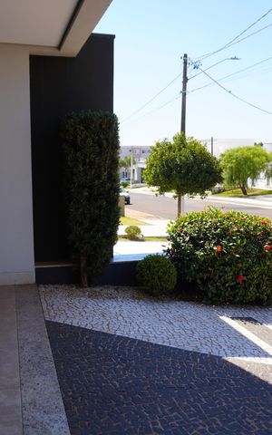 Casa de condomínio para alugar com 330m², 4 quartos e 4 vagasGaragem