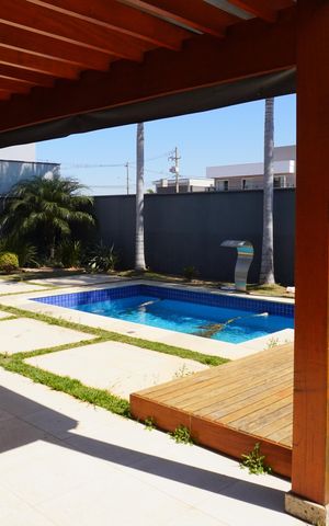Casa de condomínio para alugar com 330m², 4 quartos e 4 vagasPiscina