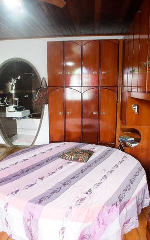 Casa de condomínio à venda com 380m², 3 quartos e 3 vagasSuíte 2