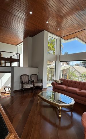 Casa de condomínio para alugar com 400m², 4 quartos e 4 vagasSala
