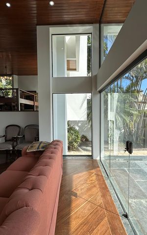 Casa de condomínio para alugar com 400m², 4 quartos e 4 vagasSala