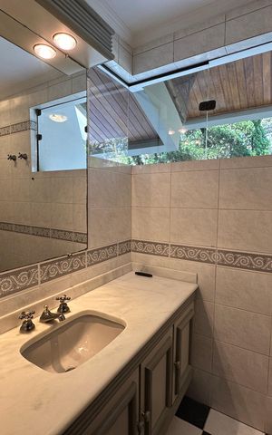 Casa de condomínio para alugar com 400m², 4 quartos e 4 vagasBanheiro da Suíte 3