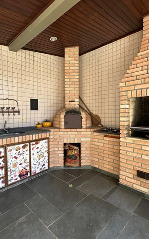 Casa de condomínio para alugar com 400m², 4 quartos e 4 vagasChurrasqueira