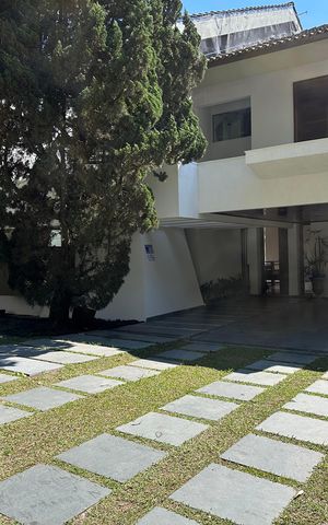 Casa de condomínio para alugar com 400m², 4 quartos e 4 vagasFachada
