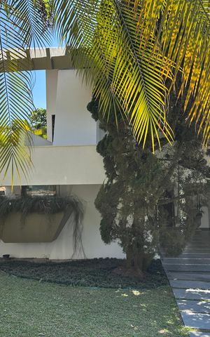 Casa de condomínio para alugar com 400m², 4 quartos e 4 vagasFachada