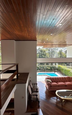 Casa de condomínio para alugar com 400m², 4 quartos e 4 vagasSala