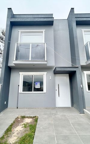 Casa à venda com 67m², 2 quartos e 1 vaga Casa à venda com 67m², 2 quartos e 1 vagaFachada
