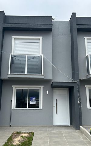 Casa à venda com 67m², 2 quartos e 1 vaga Casa à venda com 67m², 2 quartos e 1 vagaFachada