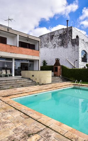 Casa à venda com 316m², 5 quartos e 4 vagasFachada Posterior
