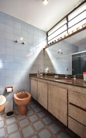 Casa à venda com 316m², 5 quartos e 4 vagasBanheiro Suíte 1