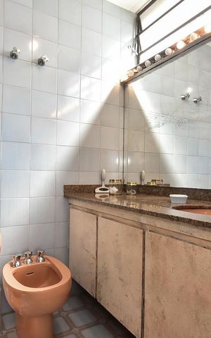 Casa à venda com 316m², 5 quartos e 4 vagasBanheiro Suíte 1