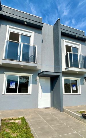 Casa à venda com 67m², 2 quartos e 1 vaga Casa à venda com 67m², 2 quartos e 1 vagaFachada
