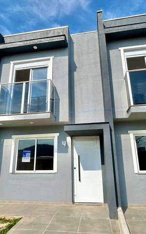 Casa à venda com 67m², 2 quartos e 1 vaga Casa à venda com 67m², 2 quartos e 1 vagaFachada