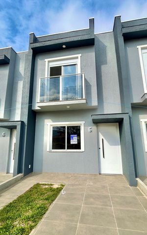 Casa à venda com 67m², 2 quartos e 1 vaga Casa à venda com 67m², 2 quartos e 1 vagaFachada