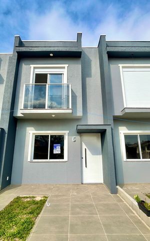 Casa à venda com 67m², 2 quartos e 1 vaga Casa à venda com 67m², 2 quartos e 1 vagaFachada